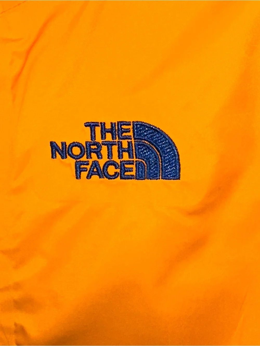 The North Face Kids Orange Hooded Rain Jacket